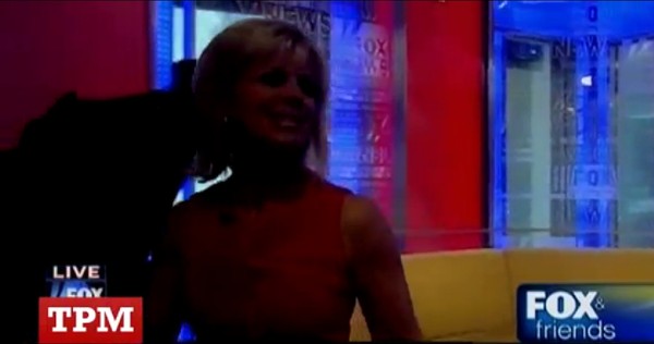 Gretchen Carlson walking off the set of Fox and friends.